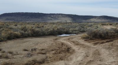 Distant Mountain views. Northern New Mexico West of Taos. 3 adjoining parcels.