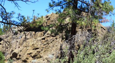Southerly facing with Unique Rock Formations and trees