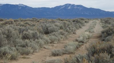 Distant Mountain views. Northern New Mexico West of Taos. 3 adjoining parcels.
