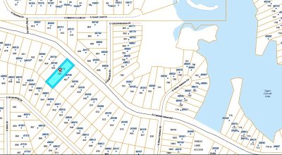 Nearly 3/4 Acre Lot on Caswell Lakes Road - Power - Developed Area by Lakes