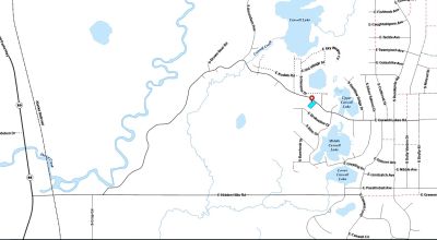 Nearly 3/4 Acre Lot on Caswell Lakes Road - Power - Developed Area by Lakes