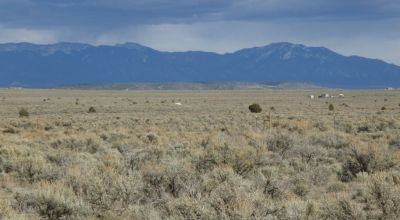 Distant Mountain views. Northern New Mexico West of Taos. 3 adjoining parcels.