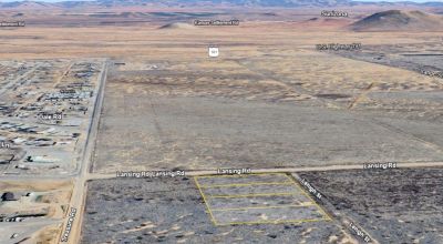 4 contiguous 0.83 acre lots right off the main road and close to Pearce