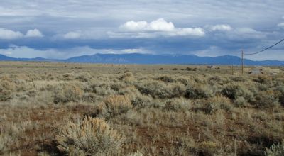 Distant Mountain views. Northern New Mexico West of Taos. 3 adjoining parcels.
