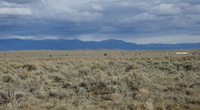 1/2 acre Northern New Mexico. Taos Tres Piedras. Distant mountain views.