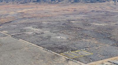 4 contiguous 0.83 acre lots right off the main road and close to Pearce