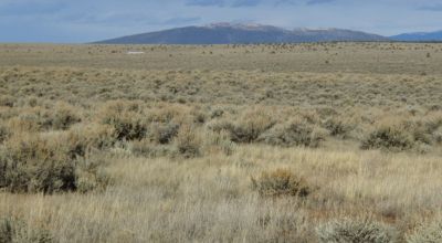 Distant Mountain views. Northern New Mexico West of Taos. 3 adjoining parcels.