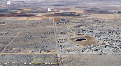 4 contiguous 0.83 acre lots right off the main road and close to Pearce
