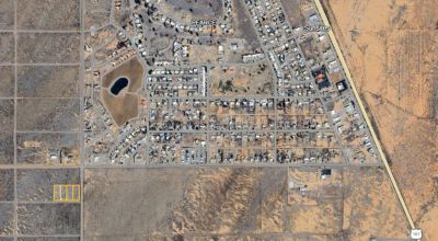 4 contiguous 0.83 acre lots right off the main road and close to Pearce