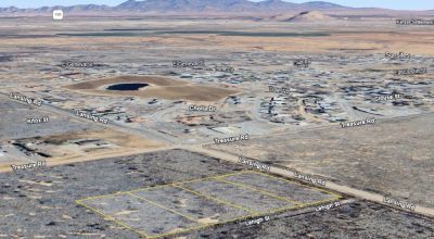 4 contiguous 0.83 acre lots right off the main road and close to Pearce