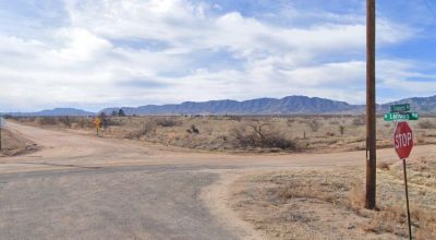 4 contiguous 0.83 acre lots right off the main road and close to Pearce