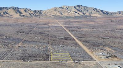 4 contiguous 0.83 acre lots right off the main road and close to Pearce